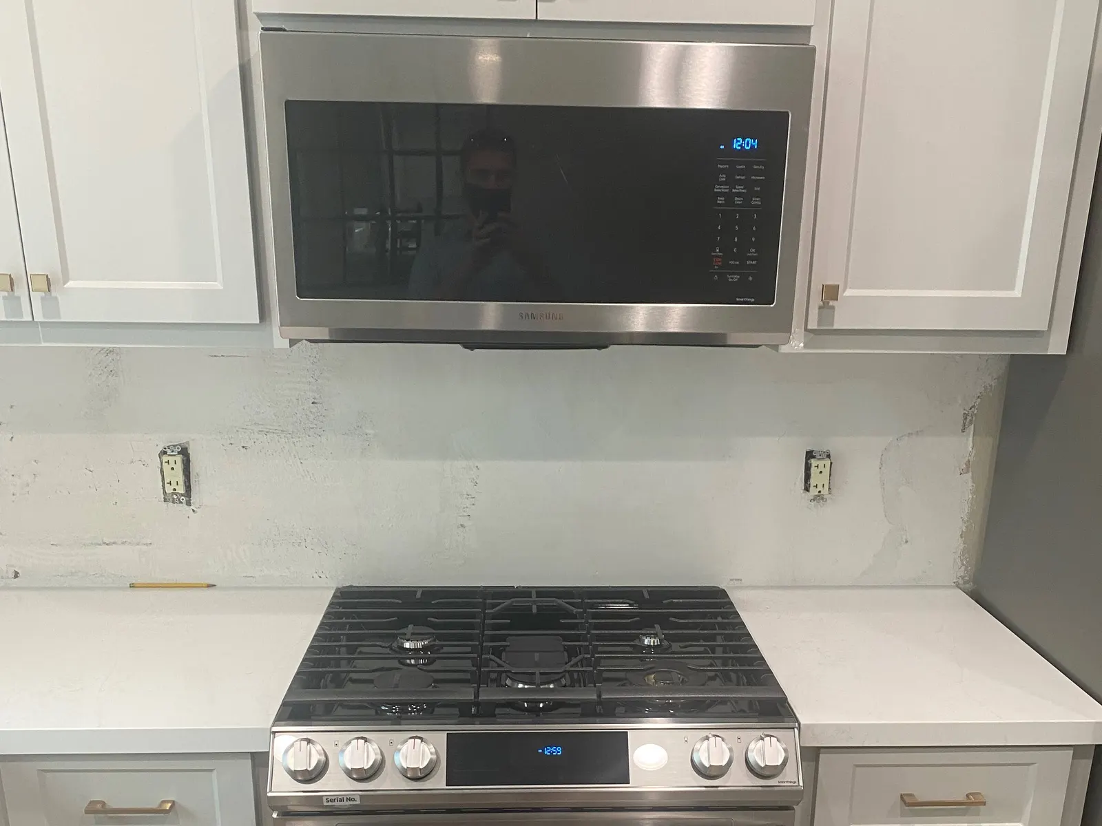 Over-the-range microwave installed above a gas range